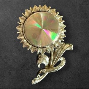 Vintage Rainbow Jewels Corp Diffraction Flower Brooch with a Holographic Center